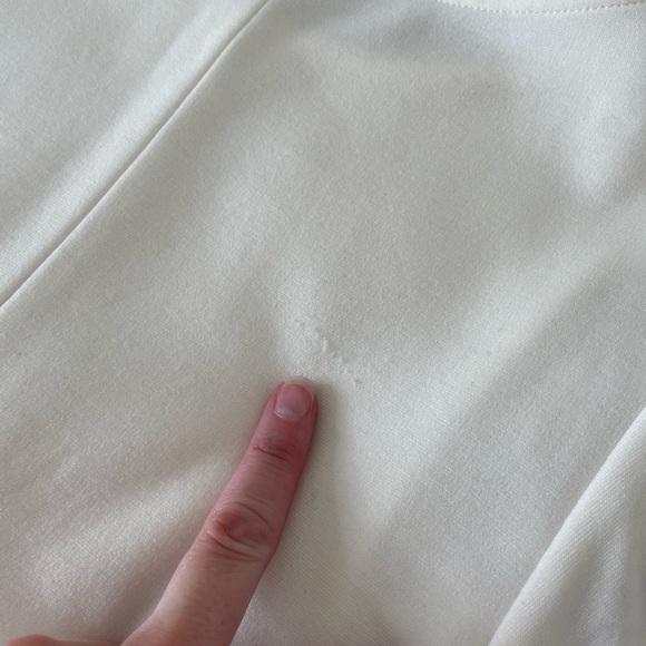 Modern, structured white top with ruched, cap short sleeves & waist pleats. - Picture 8 of 8